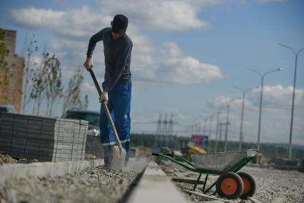 Строительство дороги в новом районе города