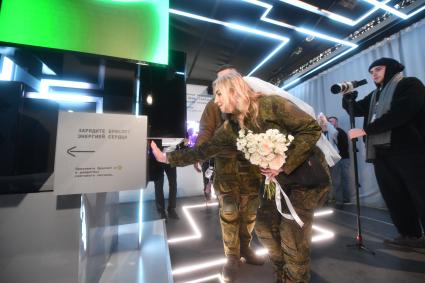 Торжественная свадебная церемония участников СВО к годовщине начала специальной военной операции