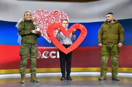 Торжественная свадебная церемония участников СВО к годовщине начала специальной военной операции
