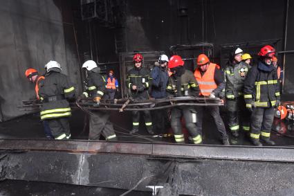 Разбор завалов после теракта в Крокус Сити Холле\" в Красногорске