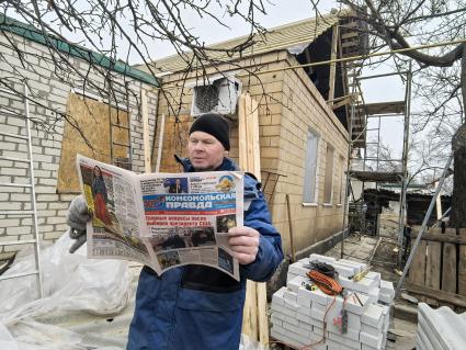 Волонтеры восстанавливают дома в освобожденной Авдеевке