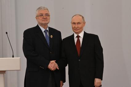 Юрий Поляков и Владимир Путин