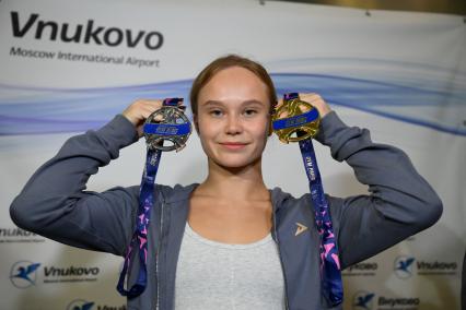 Встреча гимнастки Ангелины  Мельниковой в аэропорту Внуково