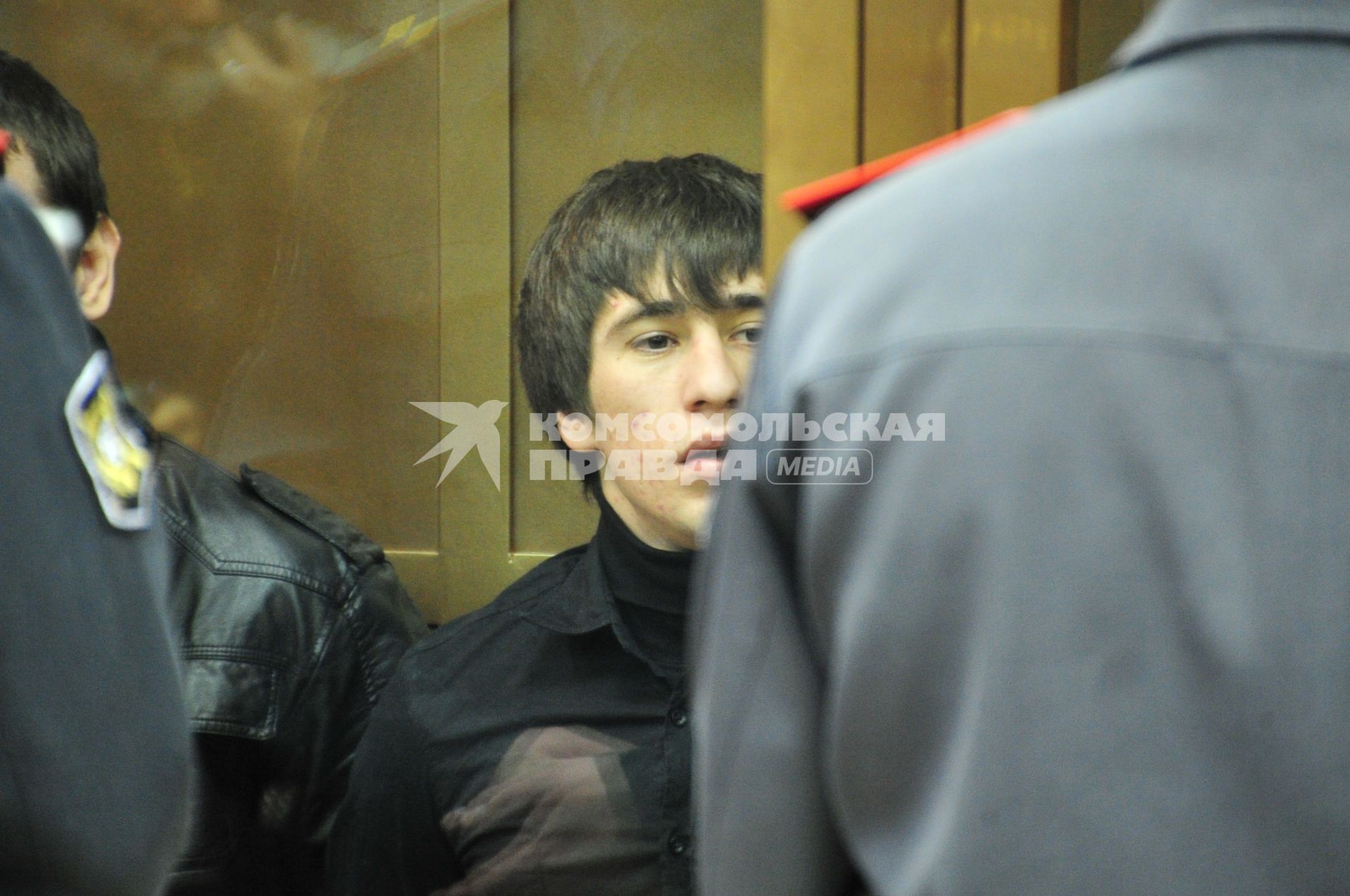 Подсудимый Артур Арсибиев, приговоренный к 5 годам колонии общего режима, в Мосгорсуде во время вынесения приговора по делу об убийстве болельщика ФК \"Спартак\" Егора Свиридова. 28 сентября 2011 года.