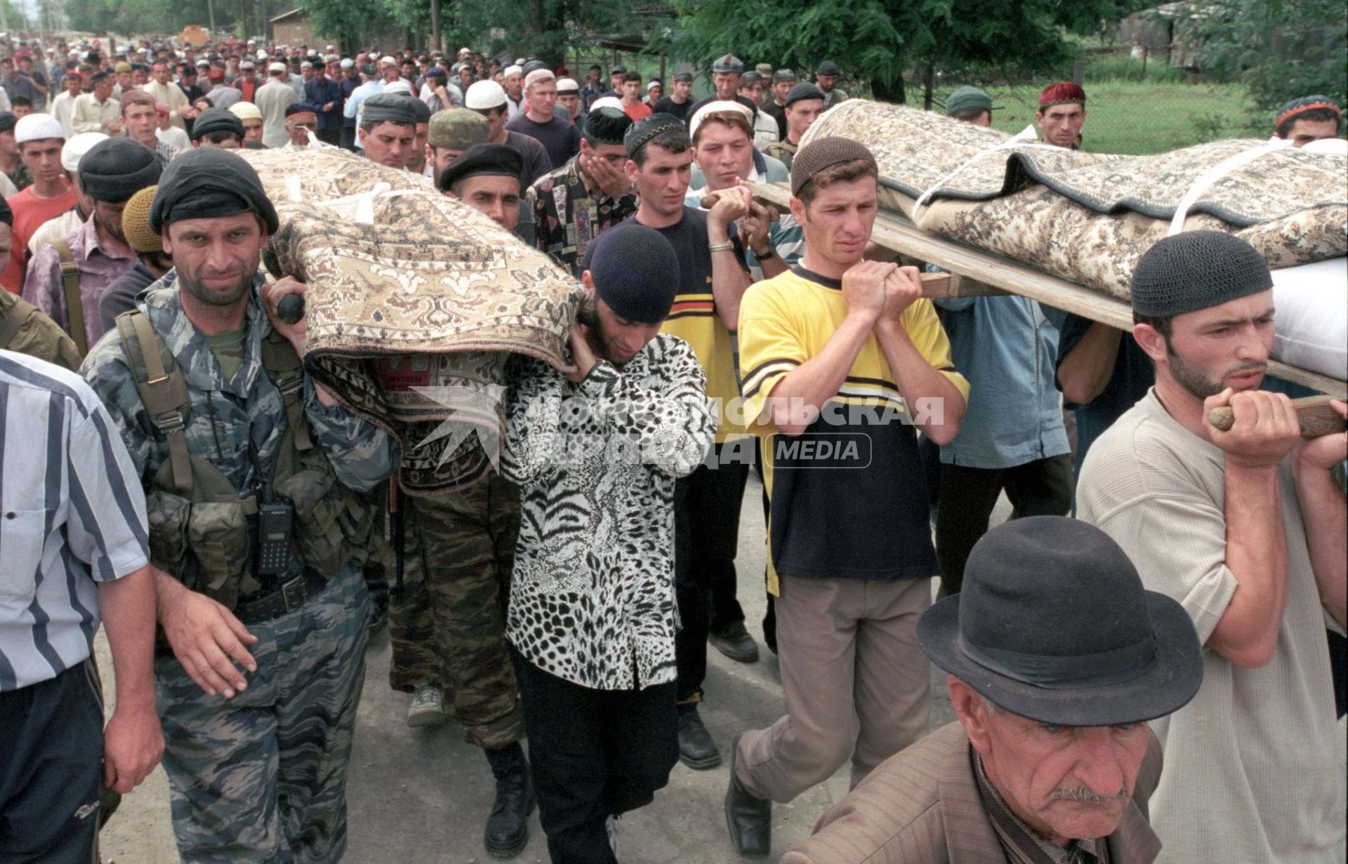 Похороны погибших во время военных действий.