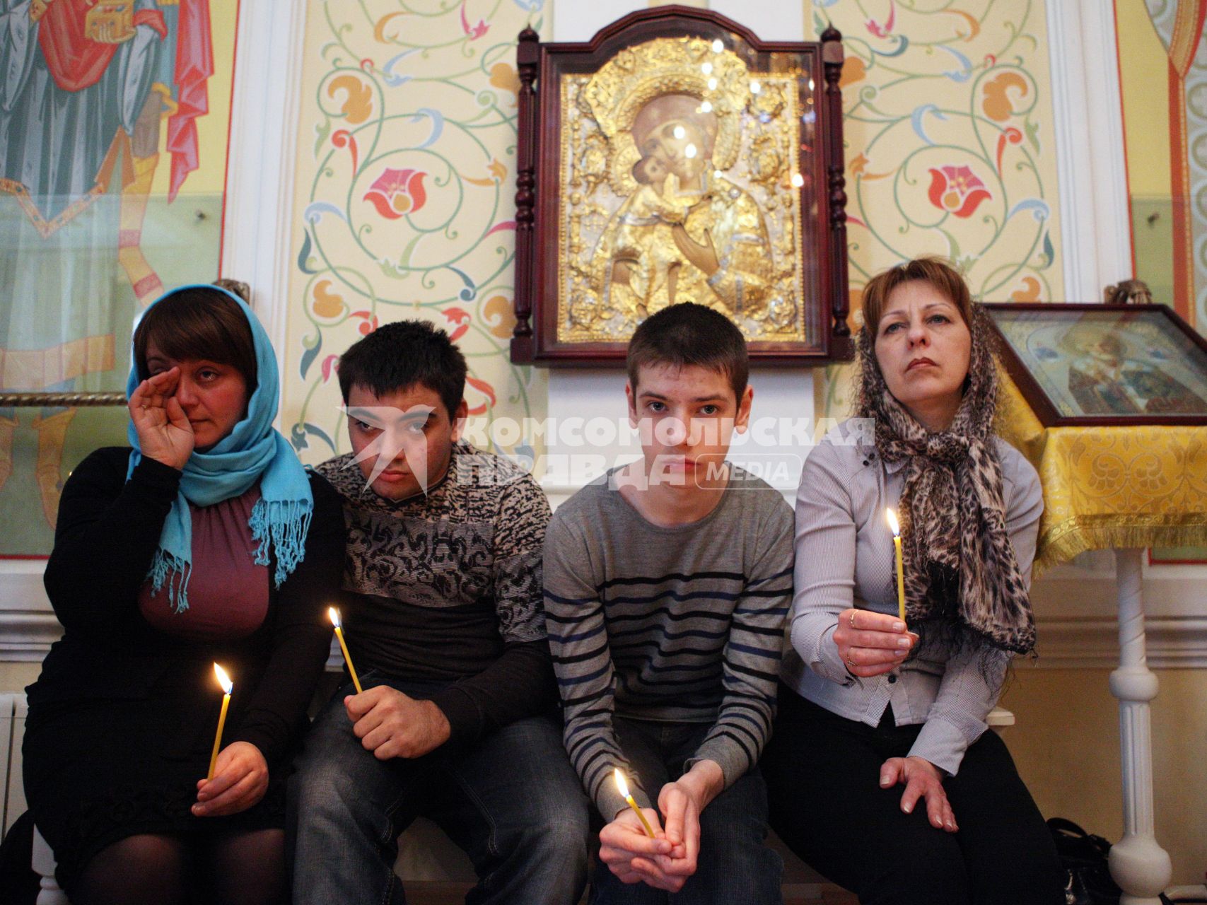 В Ставрополе, в храме Преображения господня прошел молебен детей-инвалидов. На снимке: дети с родителями в церкви.