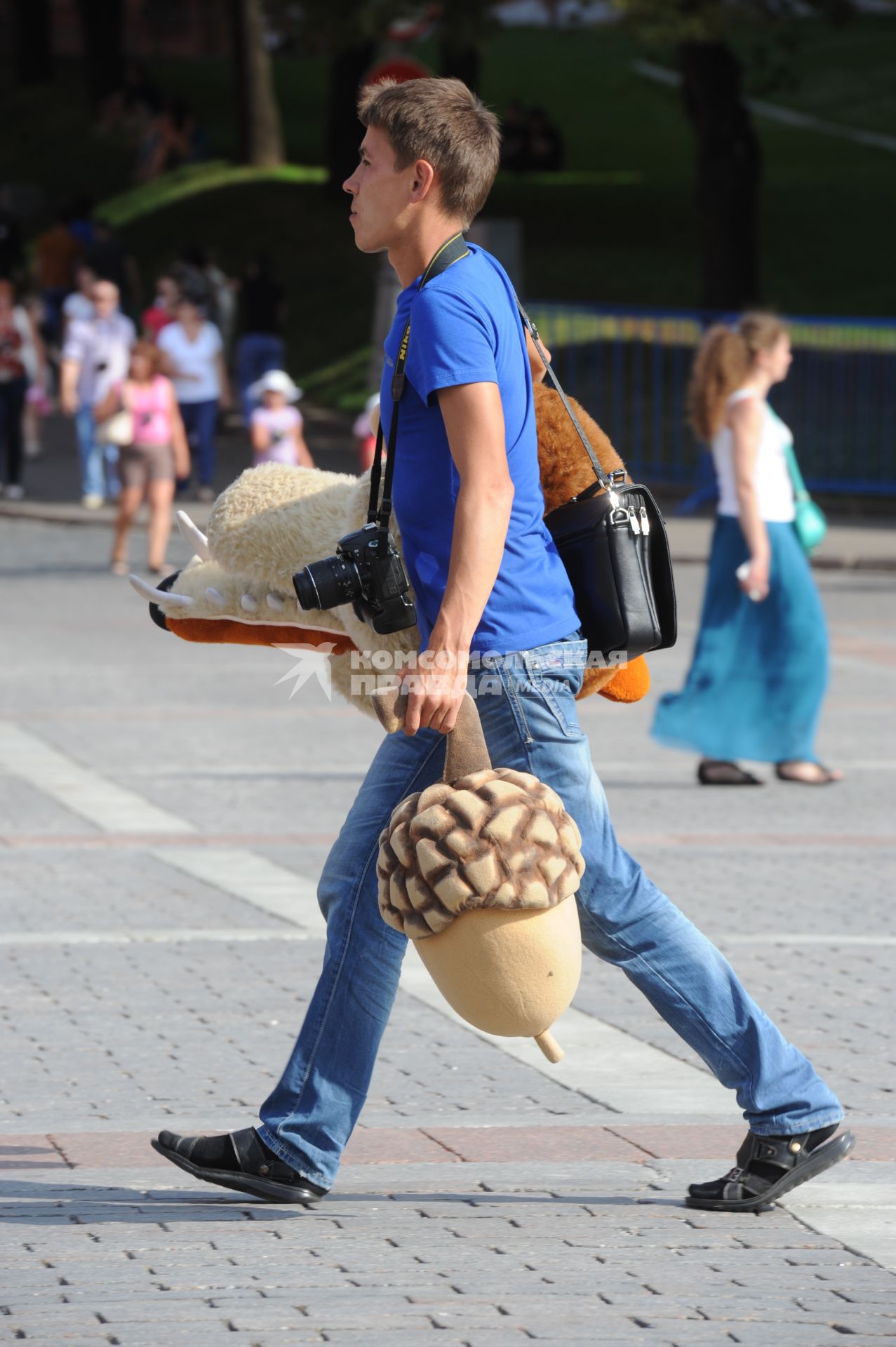 Фотограф на улицах города.