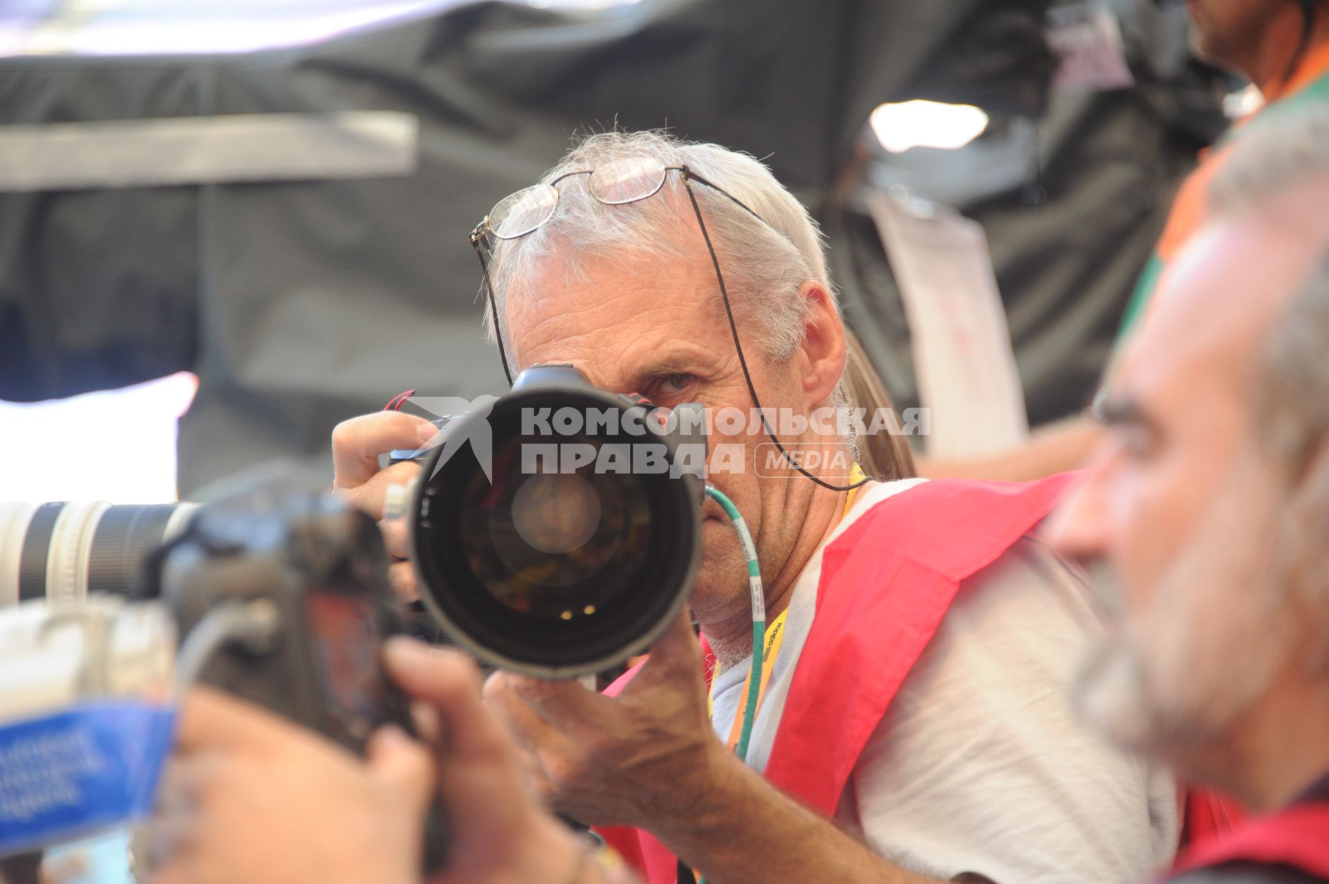 СК `Лужники`. Чемпионат мира по легкой атлетике 2013. На снимке: фотограф Виталий Белоусов