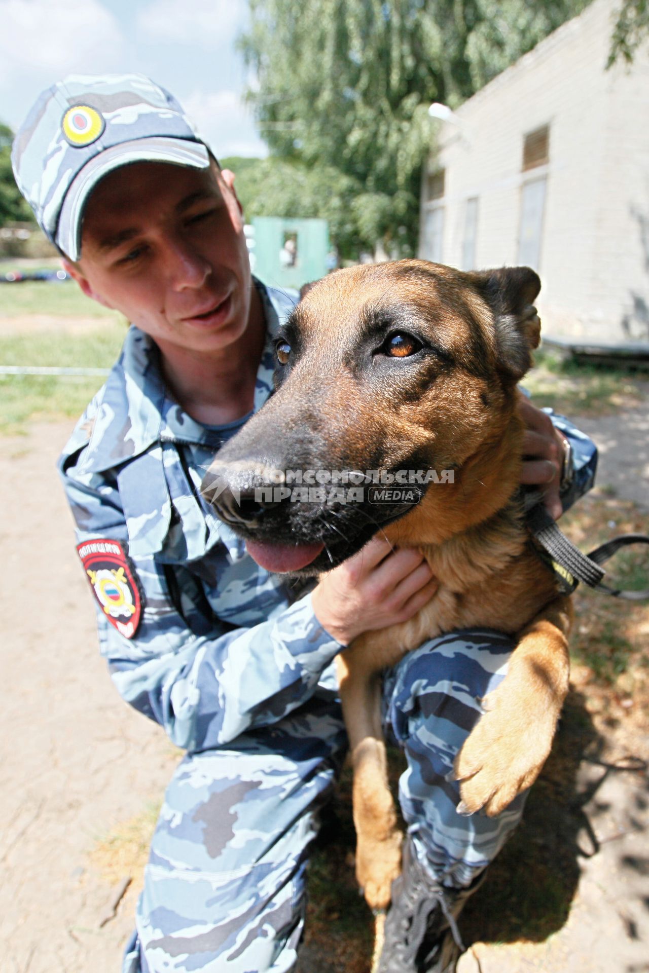 Кинолог с собакой