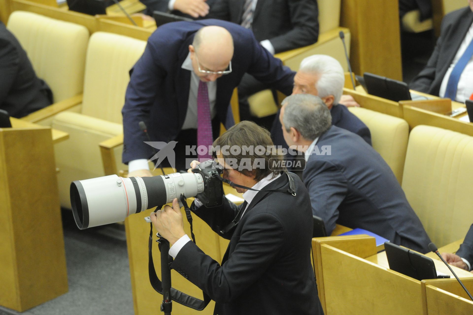 Москва. Фотокорреспондент Александр Шалгин на пленарном заседании Государственной Думы РФ.