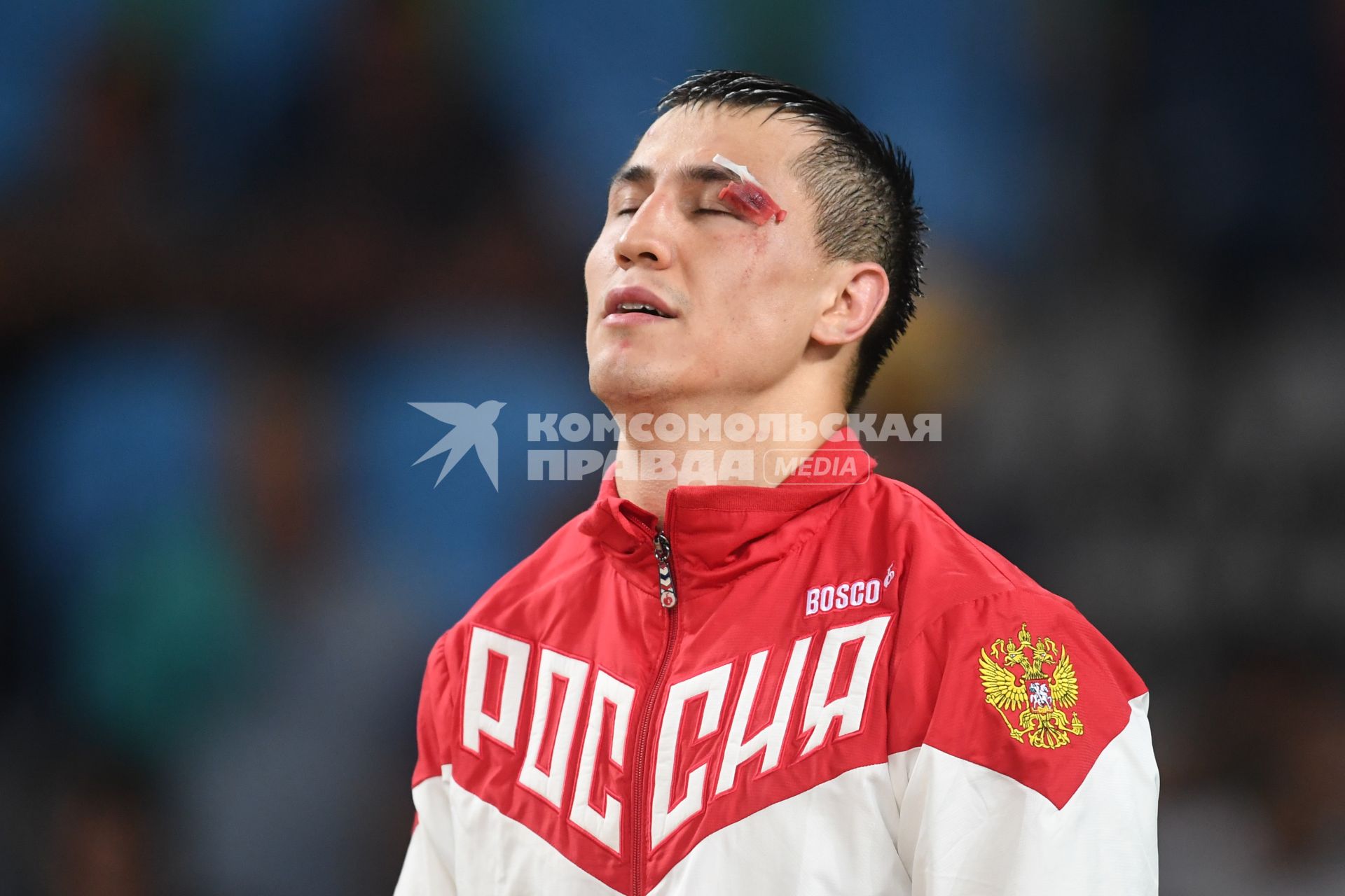 Бразилия, Рио-де-Жанейро. Российский спортсмен Роман Власов, завоевавший золотую медаль в соревнованиях по греко-римской борьбе в весовой категории до 75 кг на XXXI летних Олимпийских играх, на церемонии награждения.