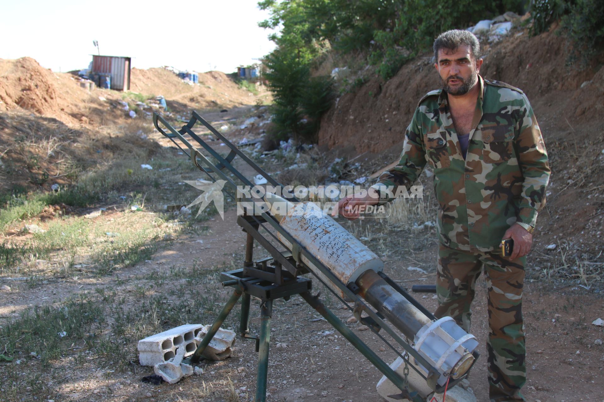 Сирия. Военннослужащие сирийской армии в южном пригороде Дамаска Ярмук.