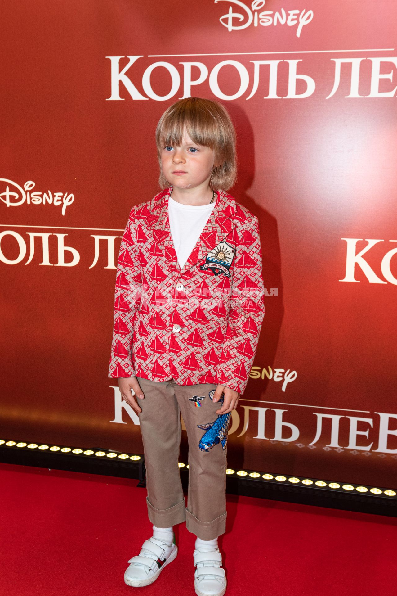 Москва.  Сын Е.Плющенко Александр Плющенко   на премьере фильма Disney `Король Лев` в кинотеатре `Каро 11 Октябрь` на Новом Арбате.