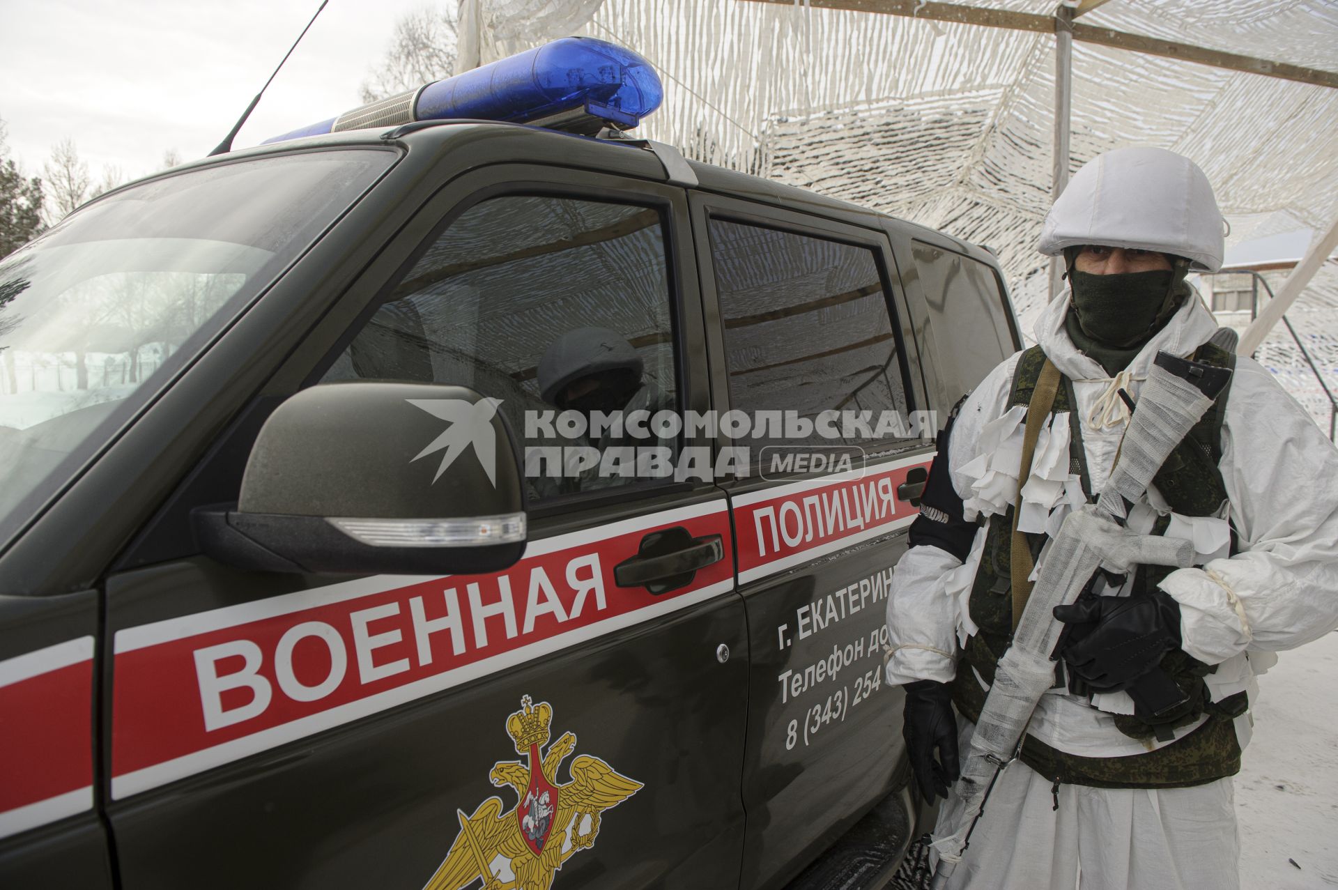 Екатеринбург. Свердловский танковый полигон. Военнослужащие военной полиции во время тактико-специальных учений по отражению нападения боевиков на блокпост, в рамках конкурса международных армейских игр Арми-2021 \'Страж порядка\'