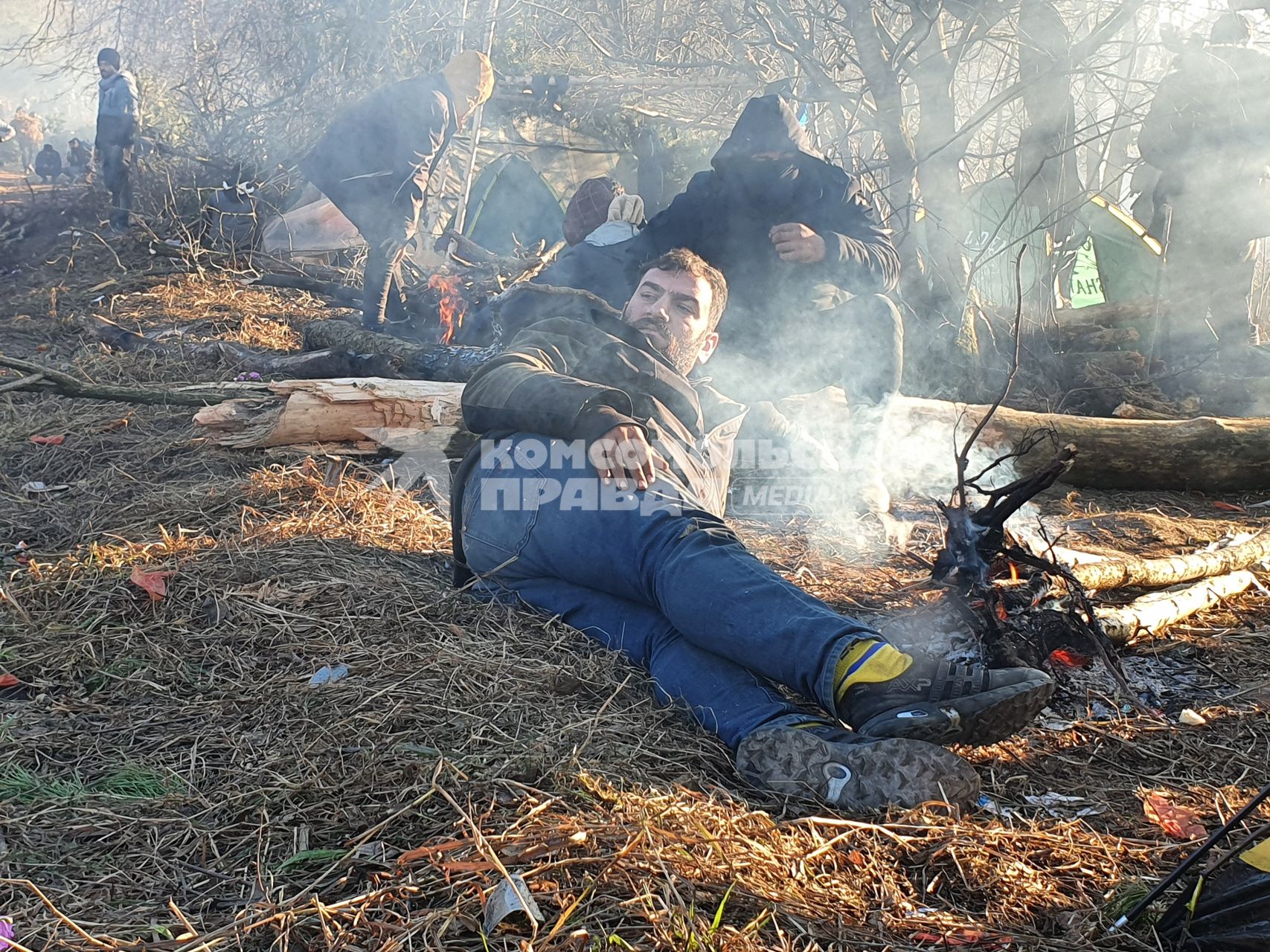 Белорусско-польская граница. Беженцы из Ближнего Востока в лагере нелегальных мигрантов.