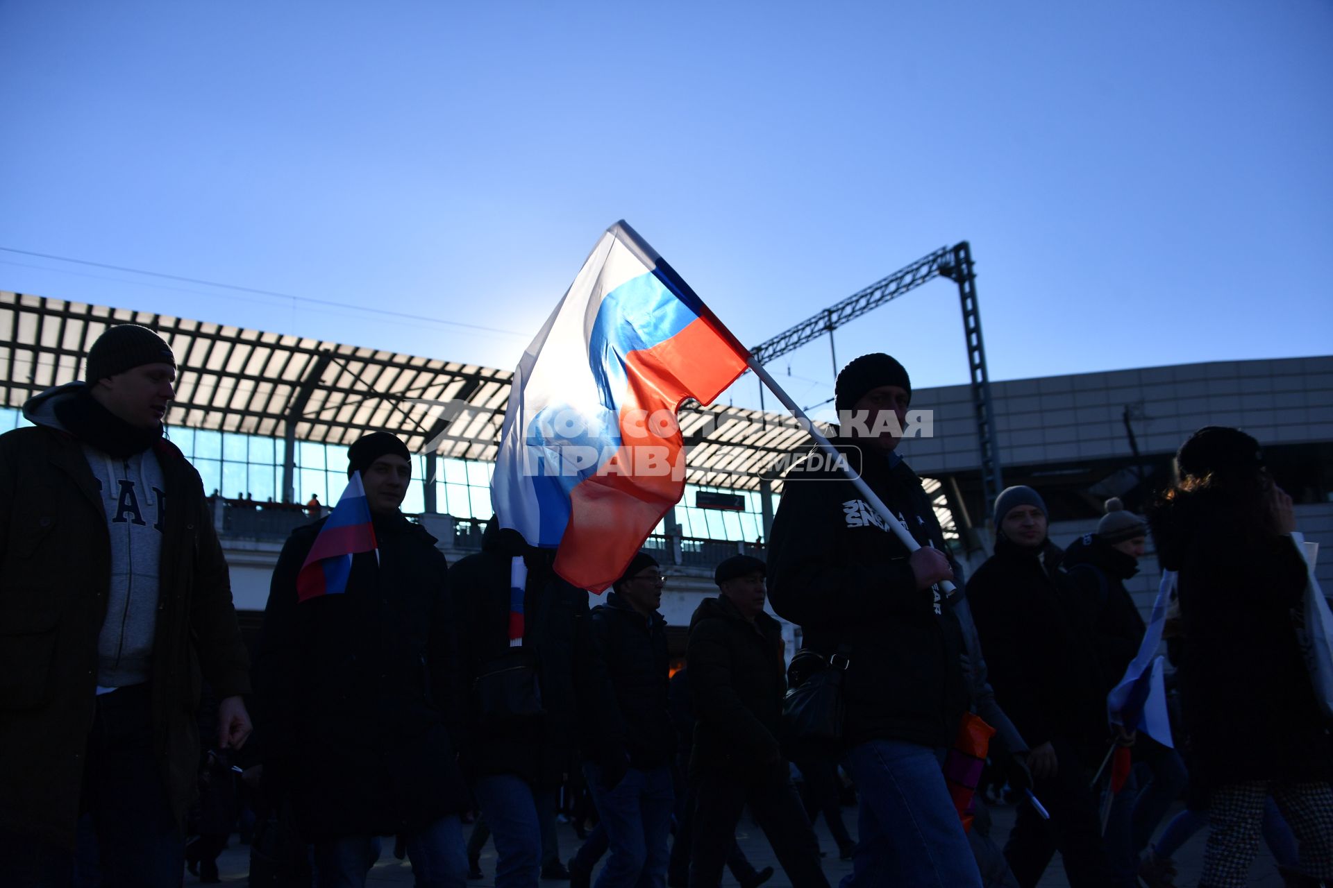 Москва. Участники митинга-концерта в `Лужниках`, посвященного 8-й годовщине воссоединения Крыма с Россией.