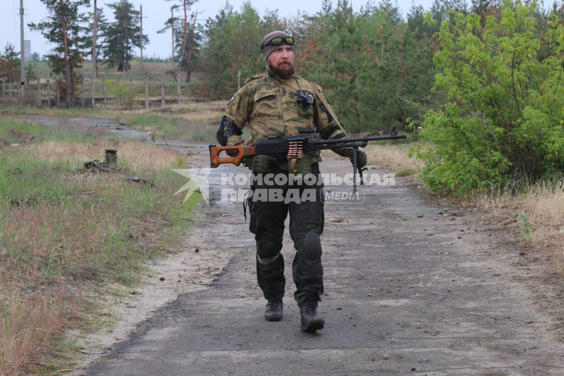 Украина. Луганская область. Военная операции РФ по демилитаризации Украины. Боец сводного отряда спецназа `Ахмат` - пулеметчик с позывным `Пушкарь` на боевых позициях под Северодонецком.