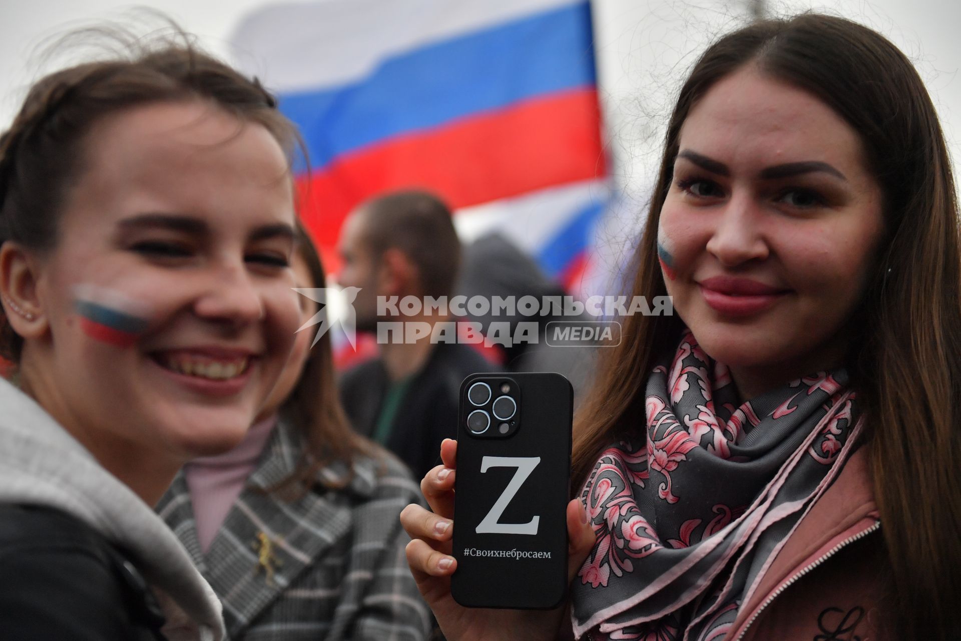 Москва. Зрители на митинге-концерте в поддержку присоединения к России ЛНР, ДНР, Херсонской и Запорожской областей на Красной площади.