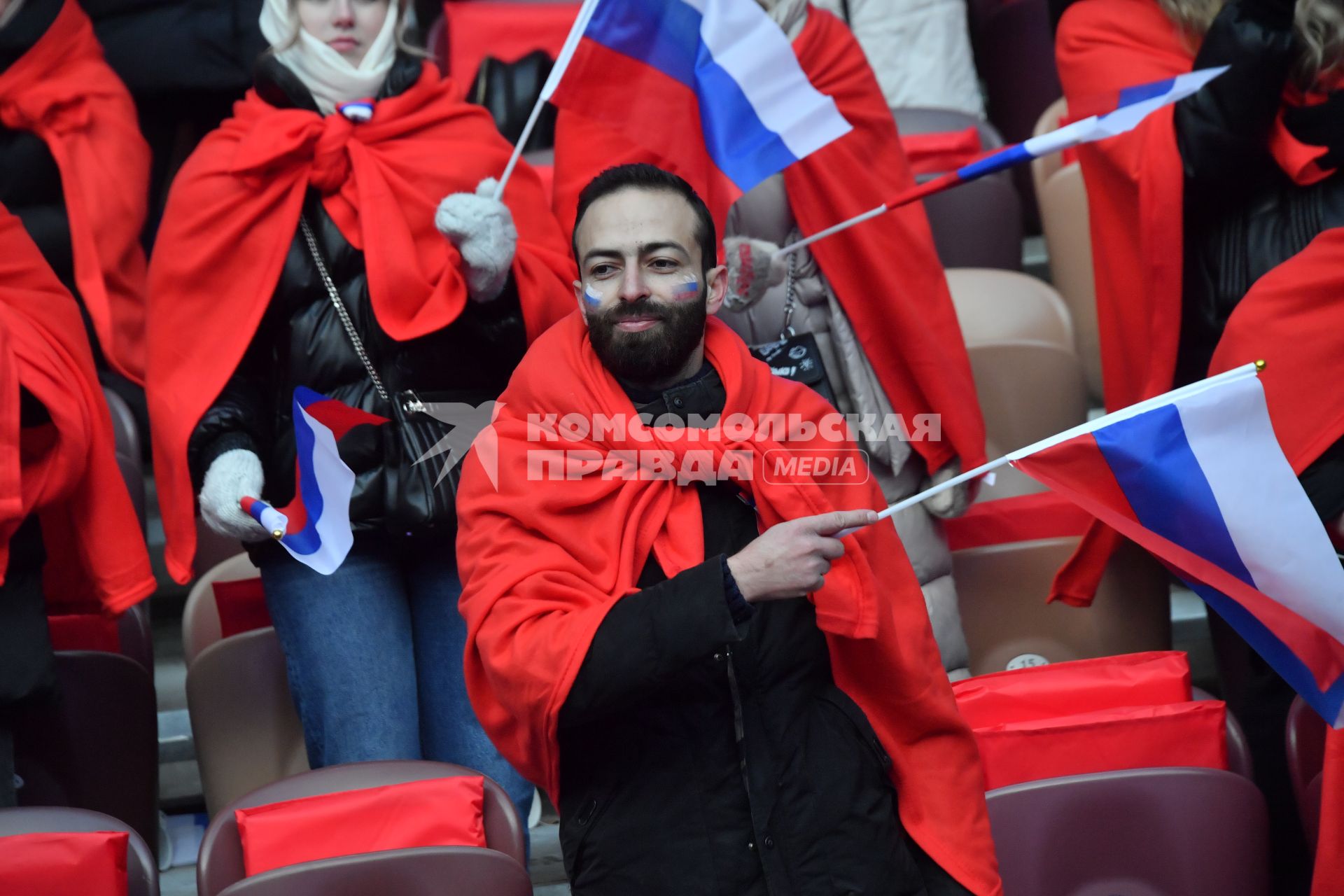 Москва.   Зрители на митинге-концерте `Слава защитникам Отечества` в Лужниках, посвященном участникам специальной военной операции и празднованию Дня защитника Отечества.