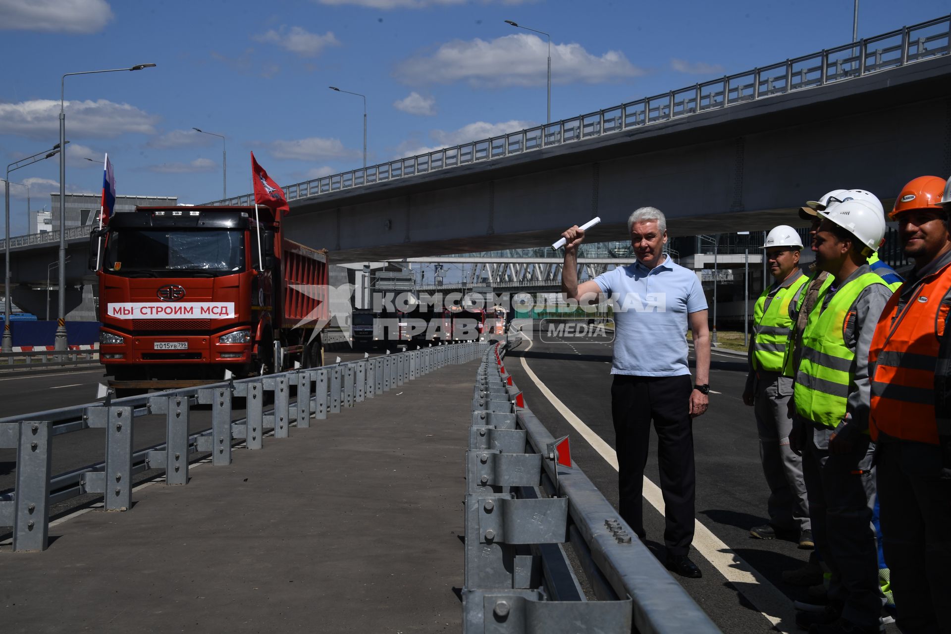 Москва.  Мэр Москвы Сергей Собянин на открытии нового участка Московского скоростного диаметра у станции МЦД Печатники.