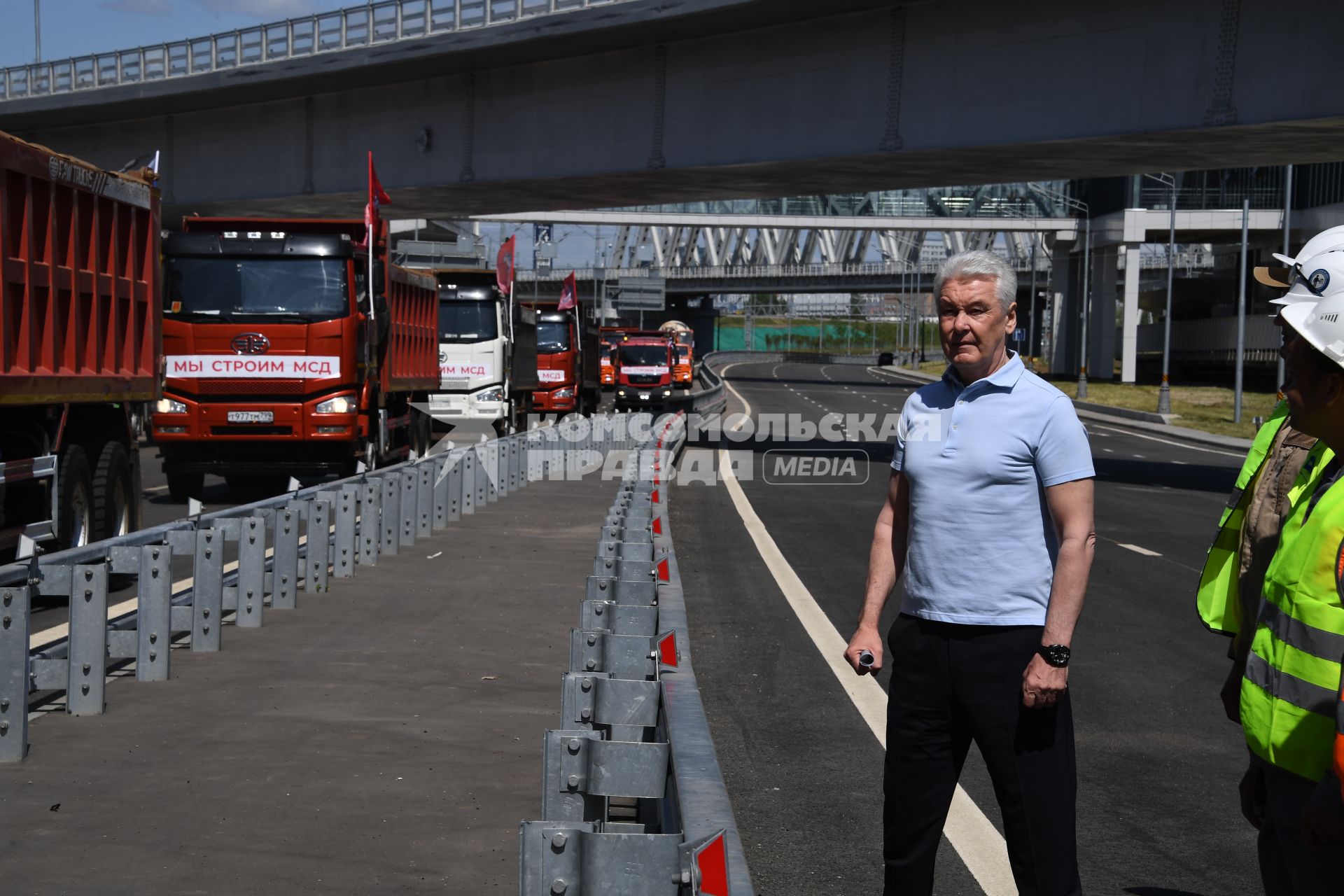 Москва.  Мэр Москвы Сергей Собянин на открытии нового участка Московского скоростного диаметра у станции МЦД Печатники.